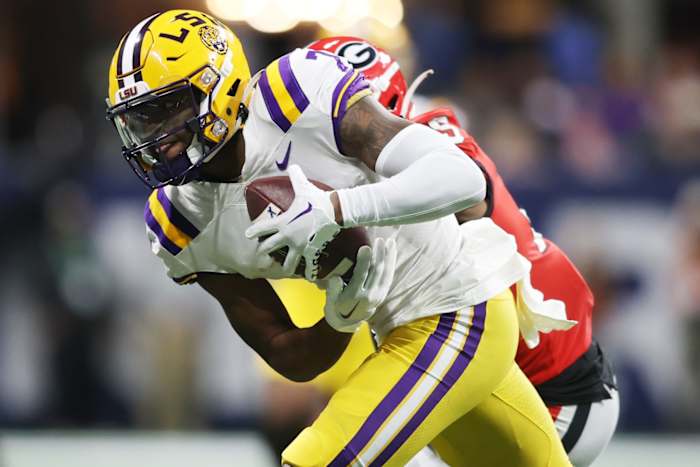 Dec 3, 2022; Atlanta, GA, USA; LSU Tigers wide receiver Kayshon Boutte (7) carries the ball following his reception against the Georgia Bulldogs during the second half at Mercedes-Benz Stadium. Mandatory Credit: Brett Davis-USA TODAY Sports